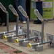 Completed street lamps with solar panels on top.